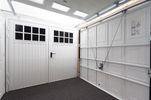 white panelled garage door and white glazed garage door