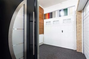 white panelled garage door with glass