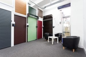 showroom with waiting area and coloured roller shutters