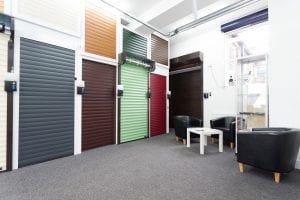 showroom with waiting area and coloured roller shutters
