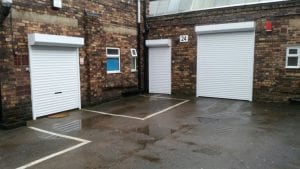 white shutter doors of different sizes