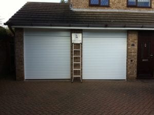 white electric roller garage doors