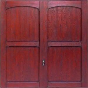 GRP Up and Overs garage door in a dark red wood colour.