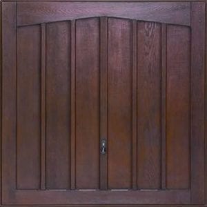 GRP Up and Overs garage door in a dark wood colour.