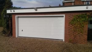 white sectional double garage door